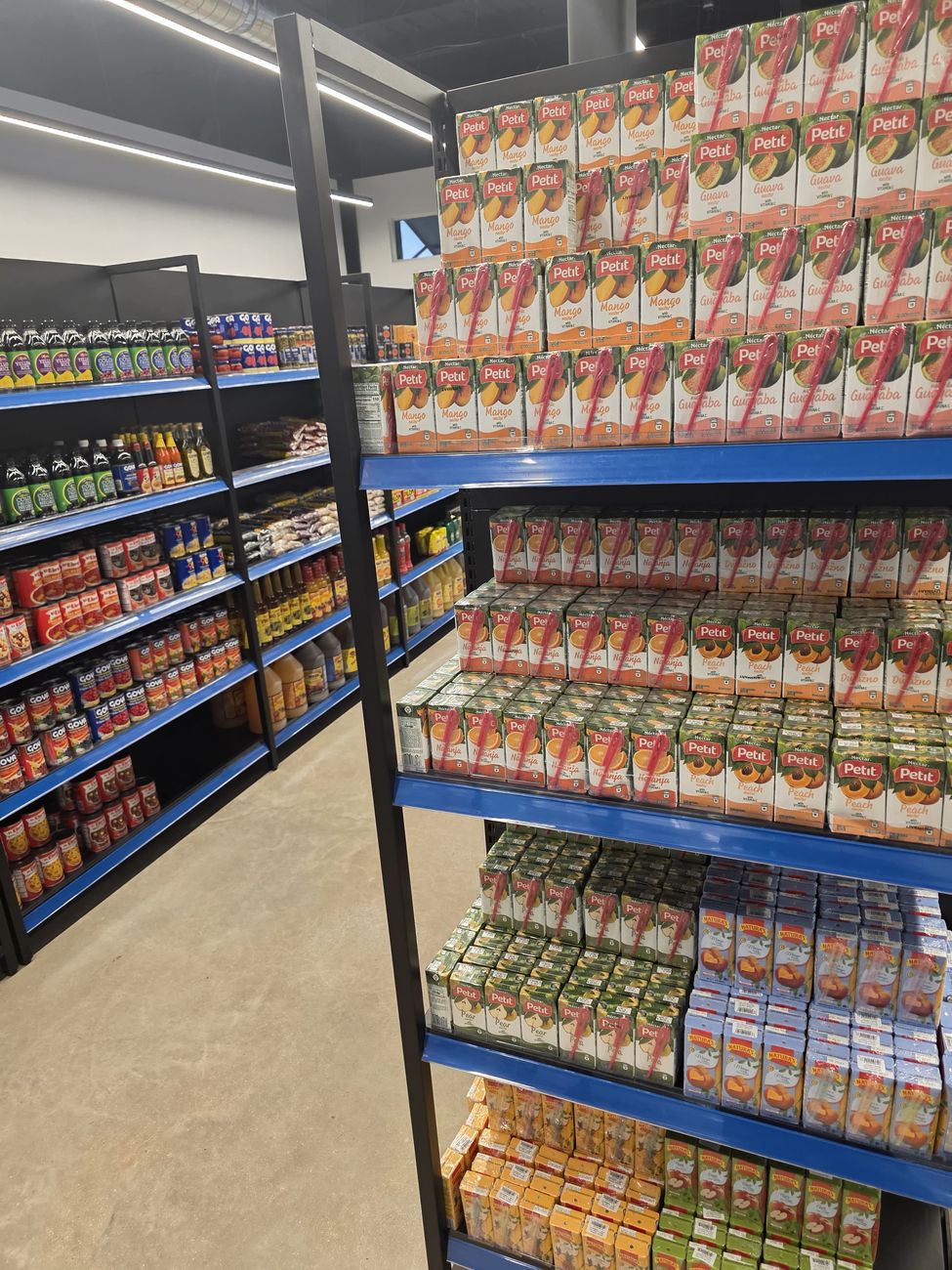 Juices and refrescos on the shelves